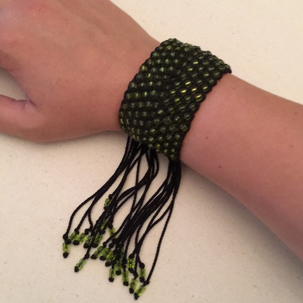 Handwoven beaded tassel bracelet